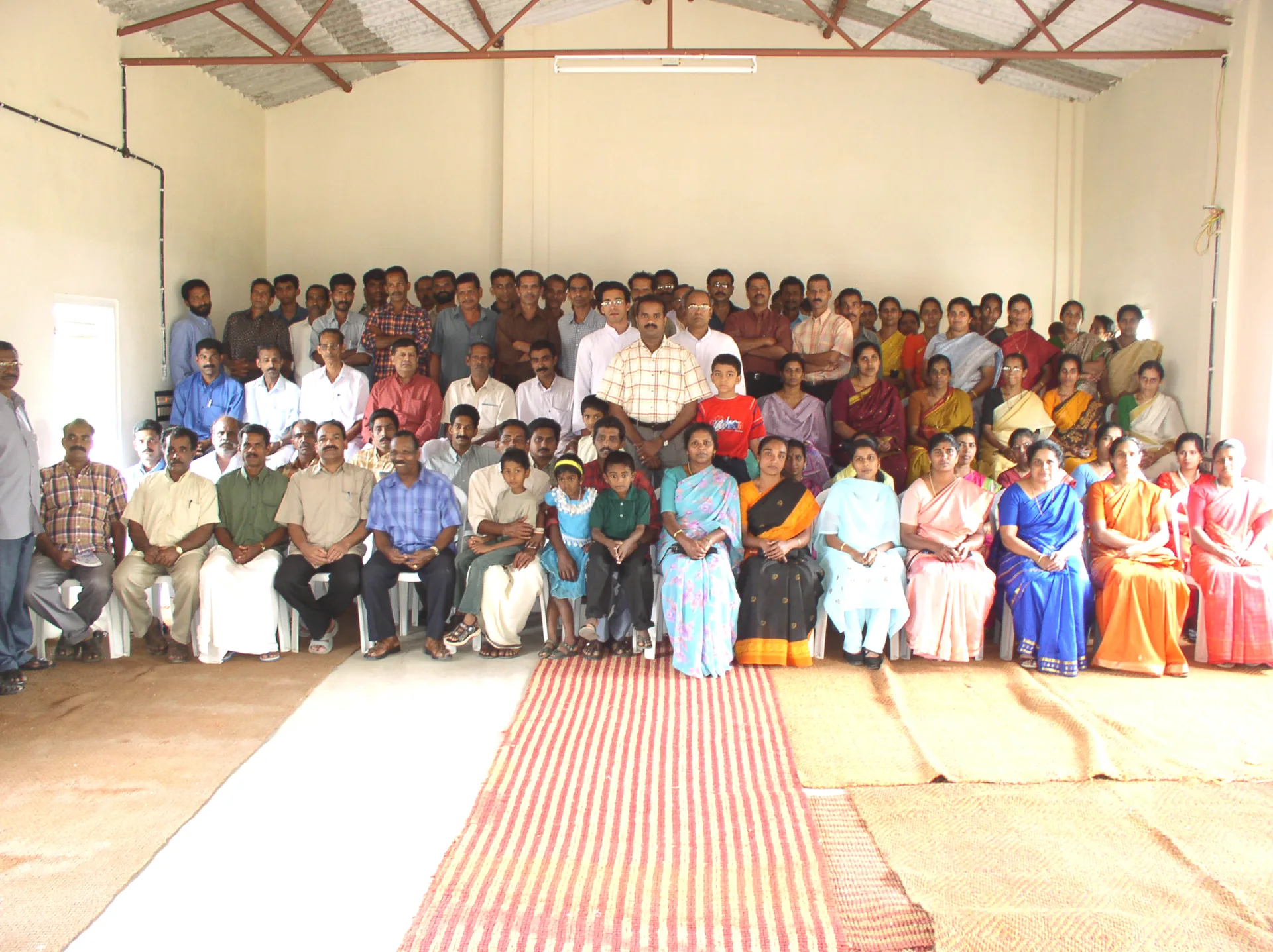 Families and community members gathered at the Navadarsanagram annual reunion